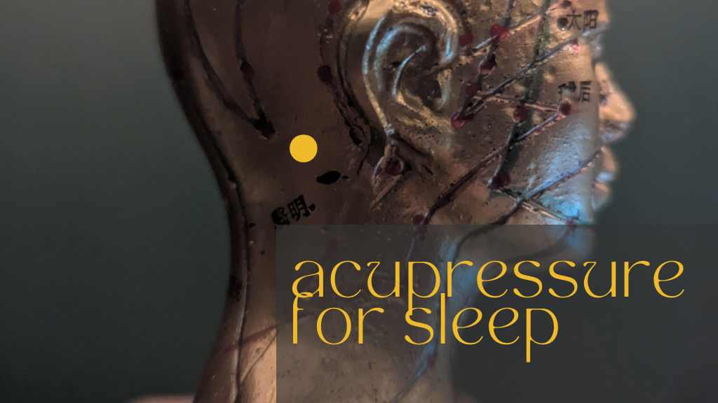 Acupressure points on a head model, highlighting a point for sleep.